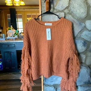 Impressions sweater size small- distressed fringed sleeves pumpkin-rust colored